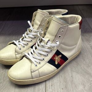 White High-Top Sneakers with Red and Blue Accents